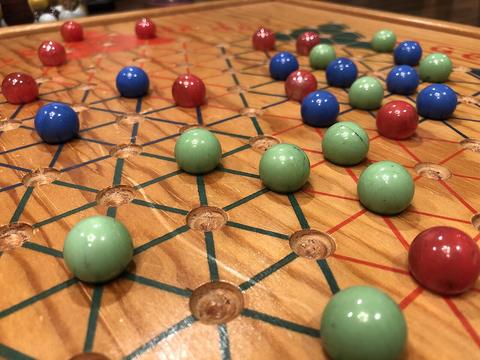 Chinese Checkers free online multiplayer game — star-shaped Chinese checkers board with colorful marbles