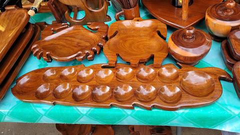 Sungka free online multiplayer game — carved wooden sungka board